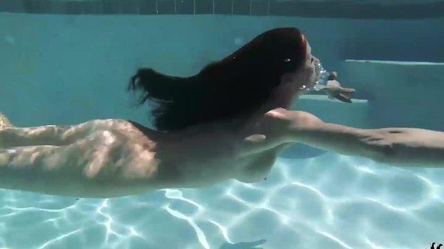Brunette MILF Sofie Marie Dives In Pool To Play With Dildos