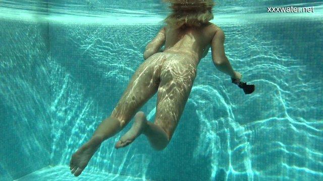 Serbian beauty swims naked underwater