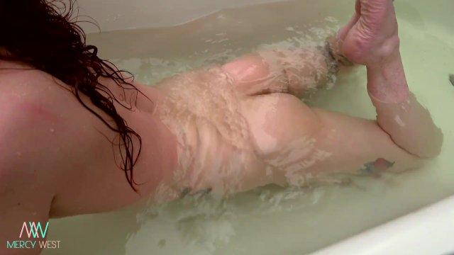 Hairy babe takes outdoor bath